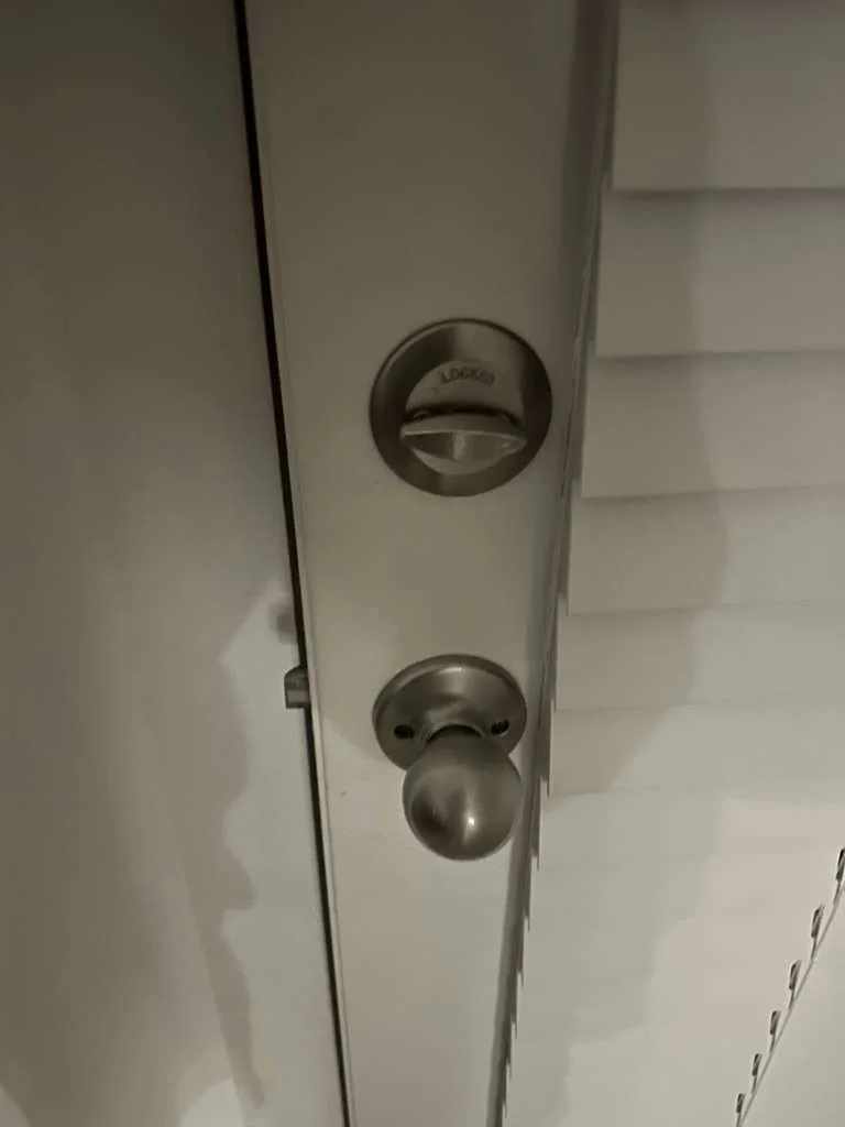 front door lock and latch checked for binding, real company service photo 4