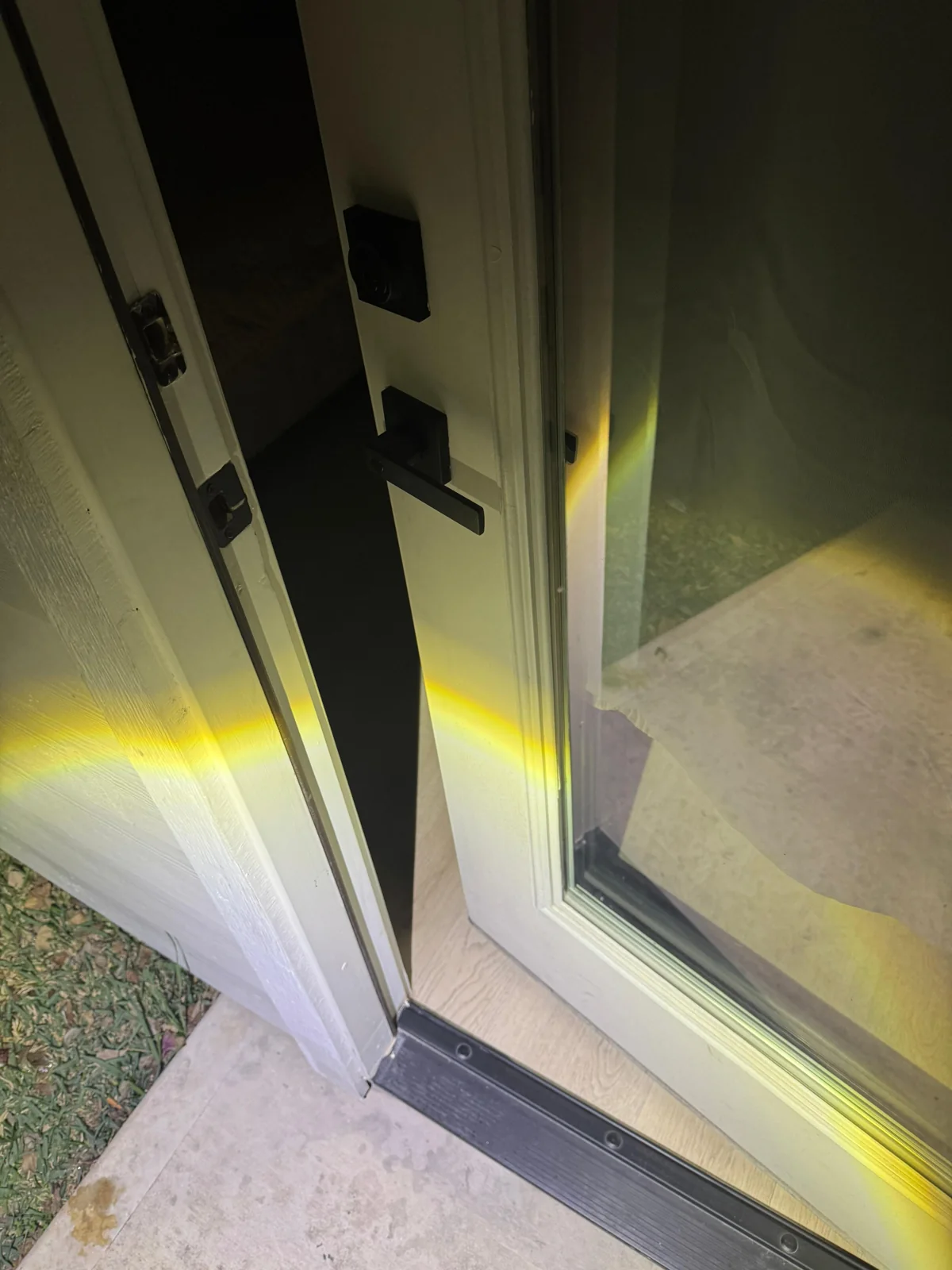 Locked Out of House at Night? What to Do Before Help Arrives 2 residential entry door during a lockout service call, real company service photo 3