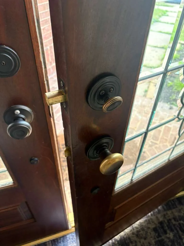 Locked Out of House at Night? What to Do Before Help Arrives 3 residential entry door during a lockout service call, real company service photo 4