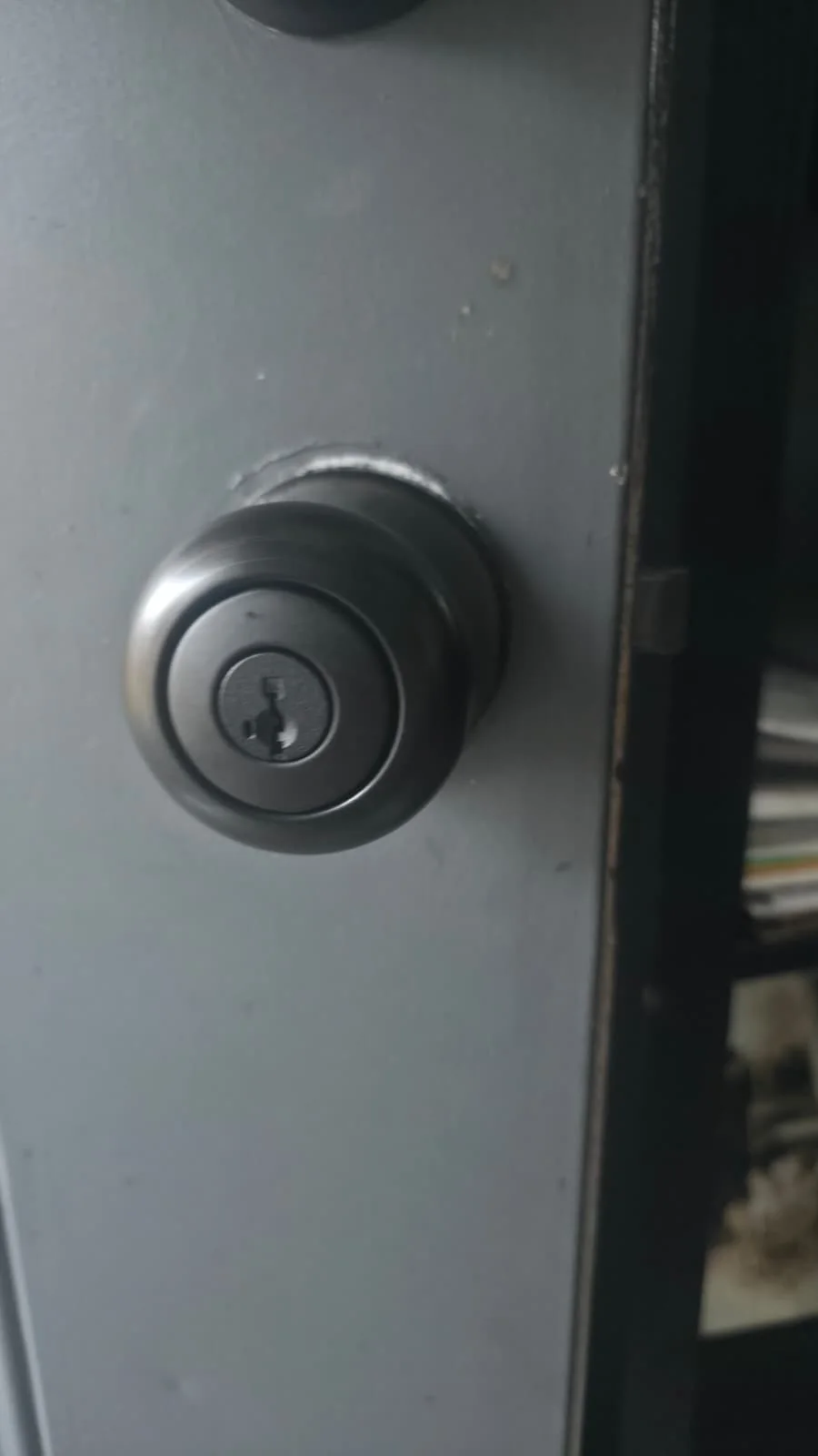 Locked Out of House at Night? What to Do Before Help Arrives 4 residential entry door during a lockout service call, real company service photo 2